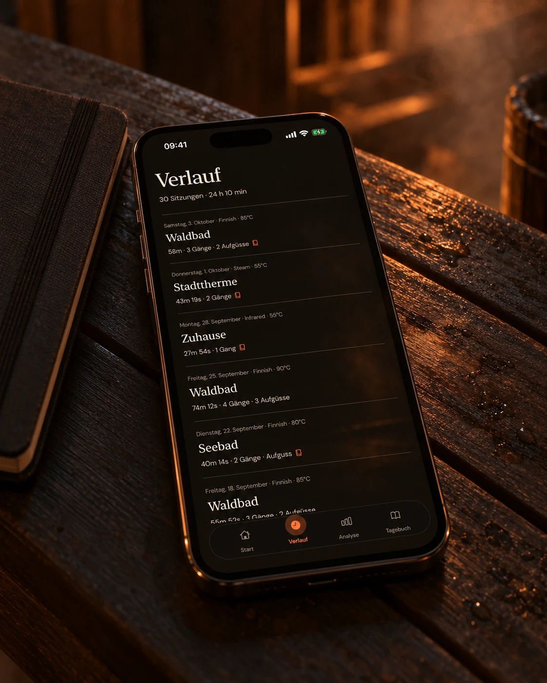 iPhone mit dem Verlauf als Chronik auf dunklem Holz